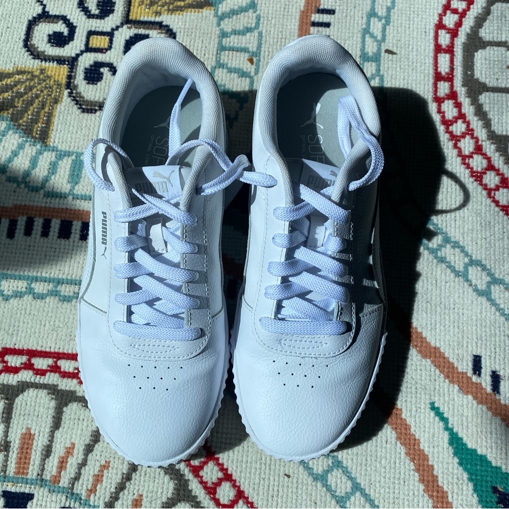 White leather Puma tennis inspired sneakers